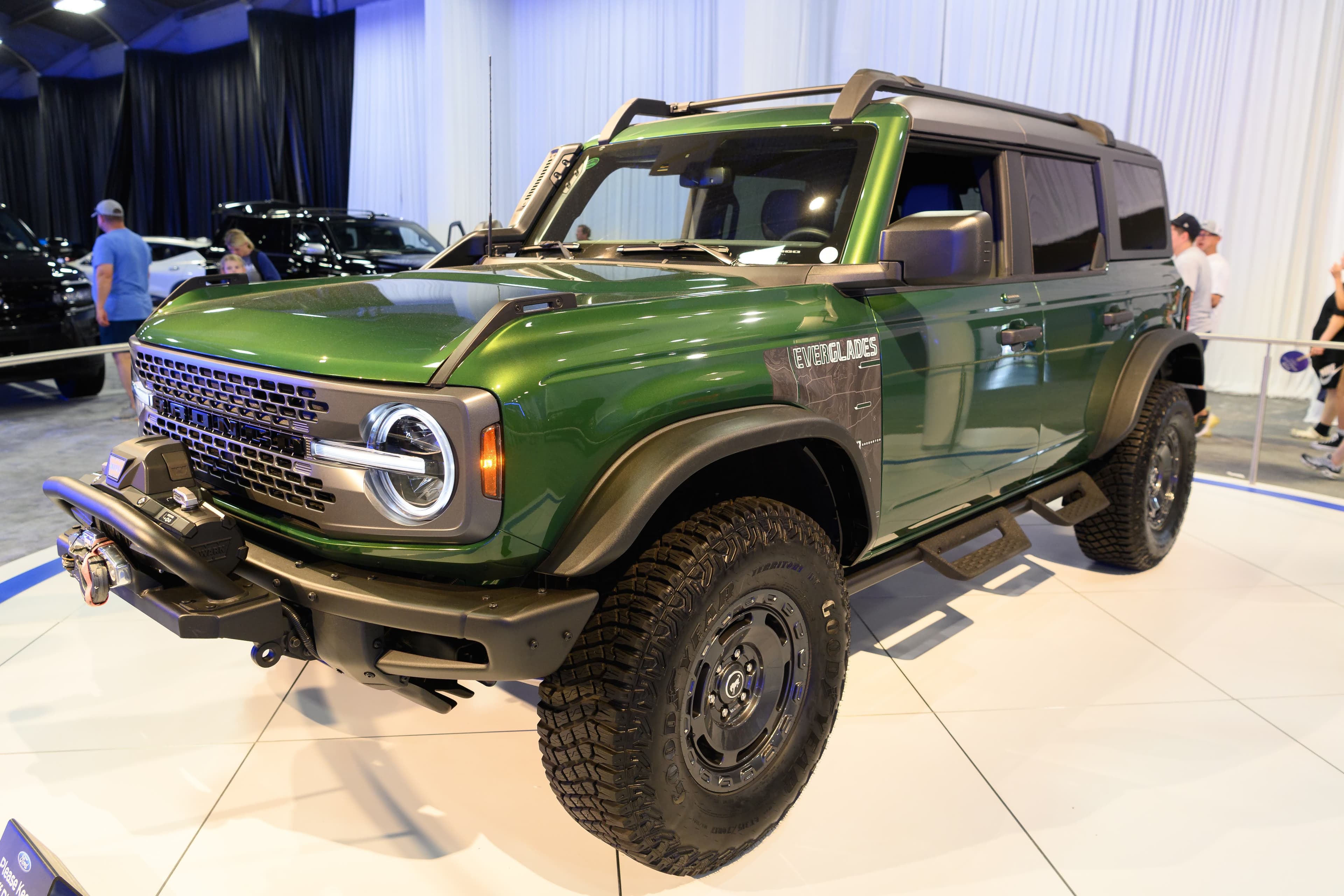 File photo: A green SUV is displayed indoors at the fair in 2023.